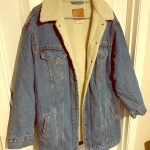 Levi’s long sherpa-lined trucker denim jacket